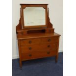 EDWARDIAN MAHOGANY AND INLAID DRESSING CHEST with a rectangular bevelled mirror above two