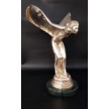 LARGE CHROME SPIRIT OF ECSTACY FIGURINE raised on a circular marble base, used as a Rolls Royce