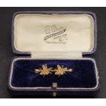 UNMARKED GOLD BROOCH set with two seed pearl decorated bees, 3cm long and 1.9 grams