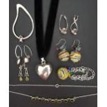 FOUR SUITES OF SILVER MOUNTED JEWELLERY comprising a pair of Murano glass bead earrings and matching