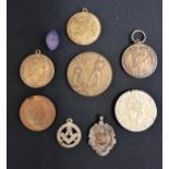 SELECTION OF FOBS AND MEDALLIONS including three Elizabeth II The Colony Of North Borneo medallions,