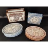 FOUR CARVED INCOLAY STONE TRINKET BOXES including a brown and white box decorated with bears, 25cm
