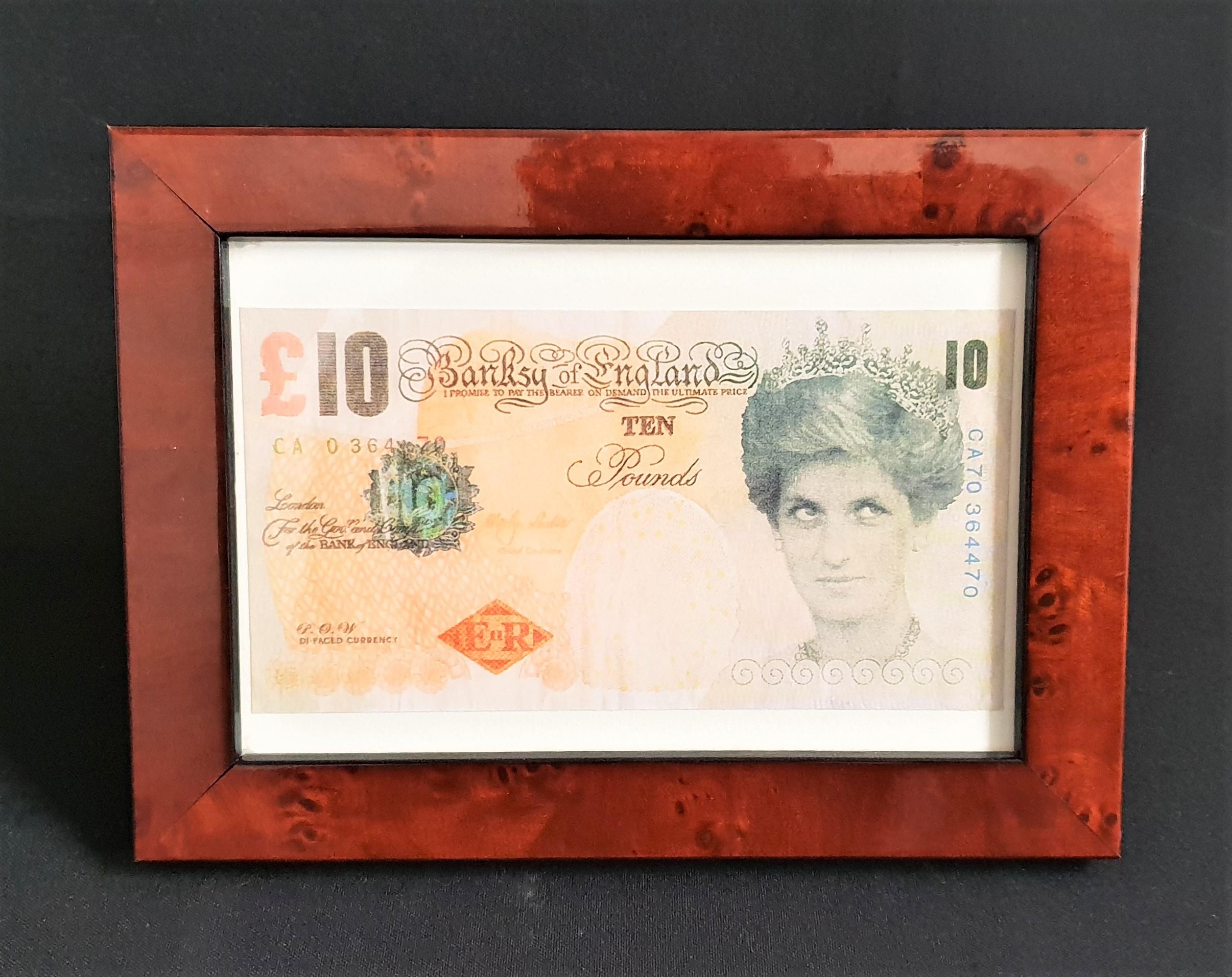 BANKSY DI-FACED £10 NOTE an original two sided Banksy note, the Queens face substituted with