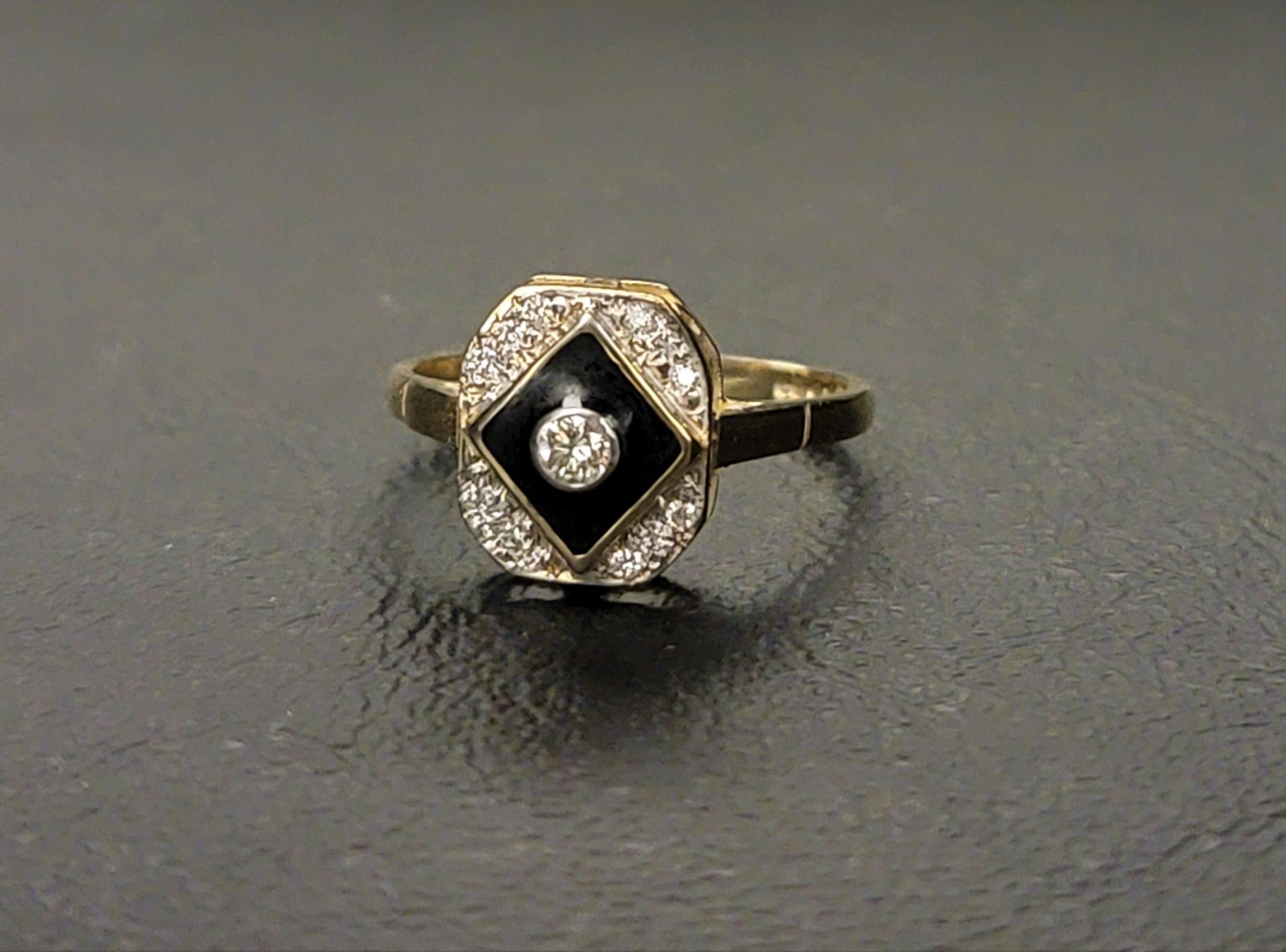ART DECO STYLE ENAMEL AND DIAMOND RING the central bezel set diamond approximately 0.07cts in a - Image 2 of 2