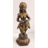 BRONZE HINDU DEITY of a female standing on a shaped base, 29cm high