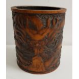 CHINESE BAMBOO BRUSH POT carved in relief with a mythical beast, 15cm high