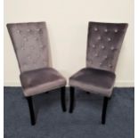 PAIR OF SIDE CHAIRS covered in a grey velvet with a crystal button backs, standing on shaped front