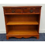 YEW SIDE CABINET with a moulded top above two frieze drawers with two shelves below, 75.5cm x 76cm