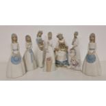 FIVE MIQUEL REQUENA FIGURINES including two girls in long dresses holding their hats, 23cm high,