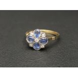PRETTY SAPPHIRE AND DIAMOND CLUSTER RING the five diamonds interspersed with four oval cut