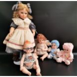 THE FRANKLIN MINT COLLECTOR DOLLS 'Crying Bryna' and 'Winged Cherub', and Harley-Davidson