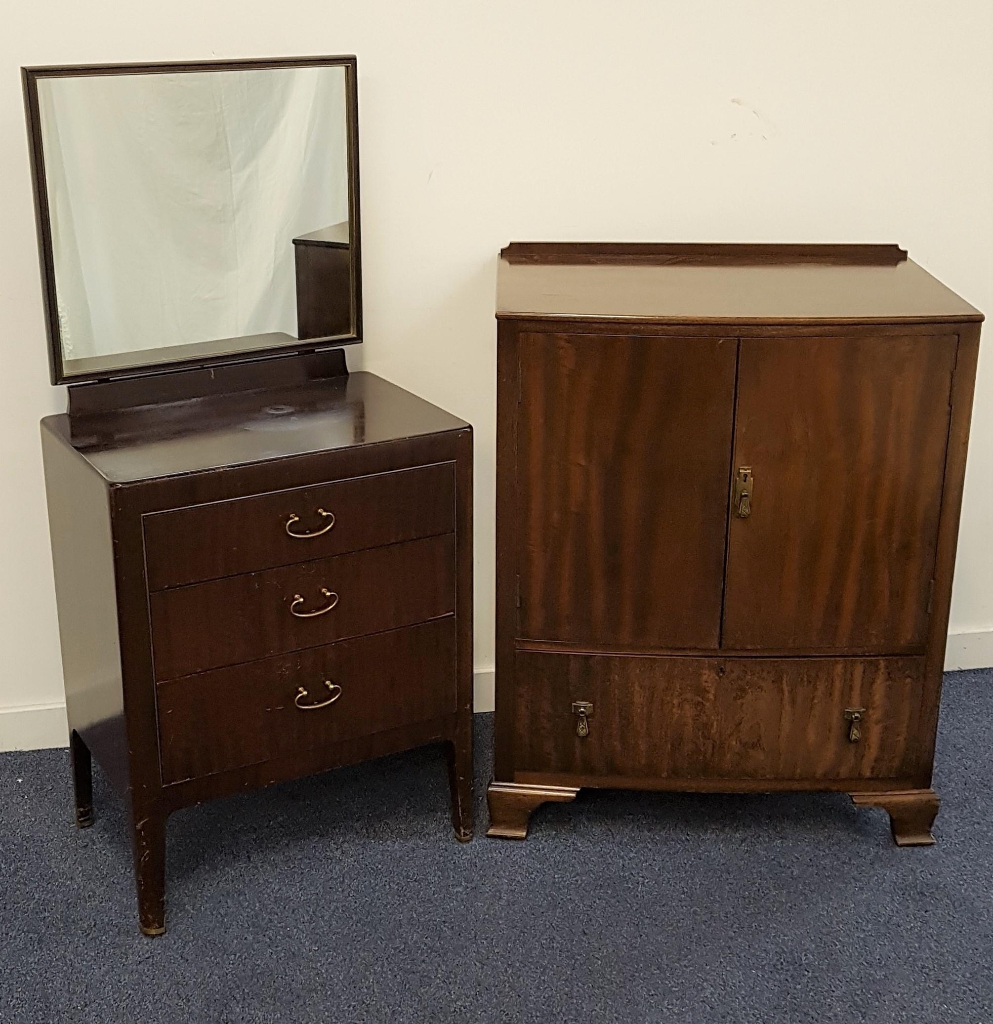 MAHOGANY BOW FRONT CUPBOARD with a pair of doors opening to reveal a shelved interior above a