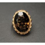 SMOKY QUARTZ DRESS RING the large oval cut topaz measuring approximately 17.7mm x 13.2mm x 7.8mm, in