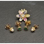 SELECTION OF NINE CARAT GOLD JEWELLERY comprising a coloured glass set pendant in a floral motif,