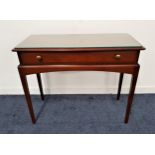 STAG CHERRY HALL TABLE with a moulded top above a frieze drawer, standing on tapering supports, 74cm