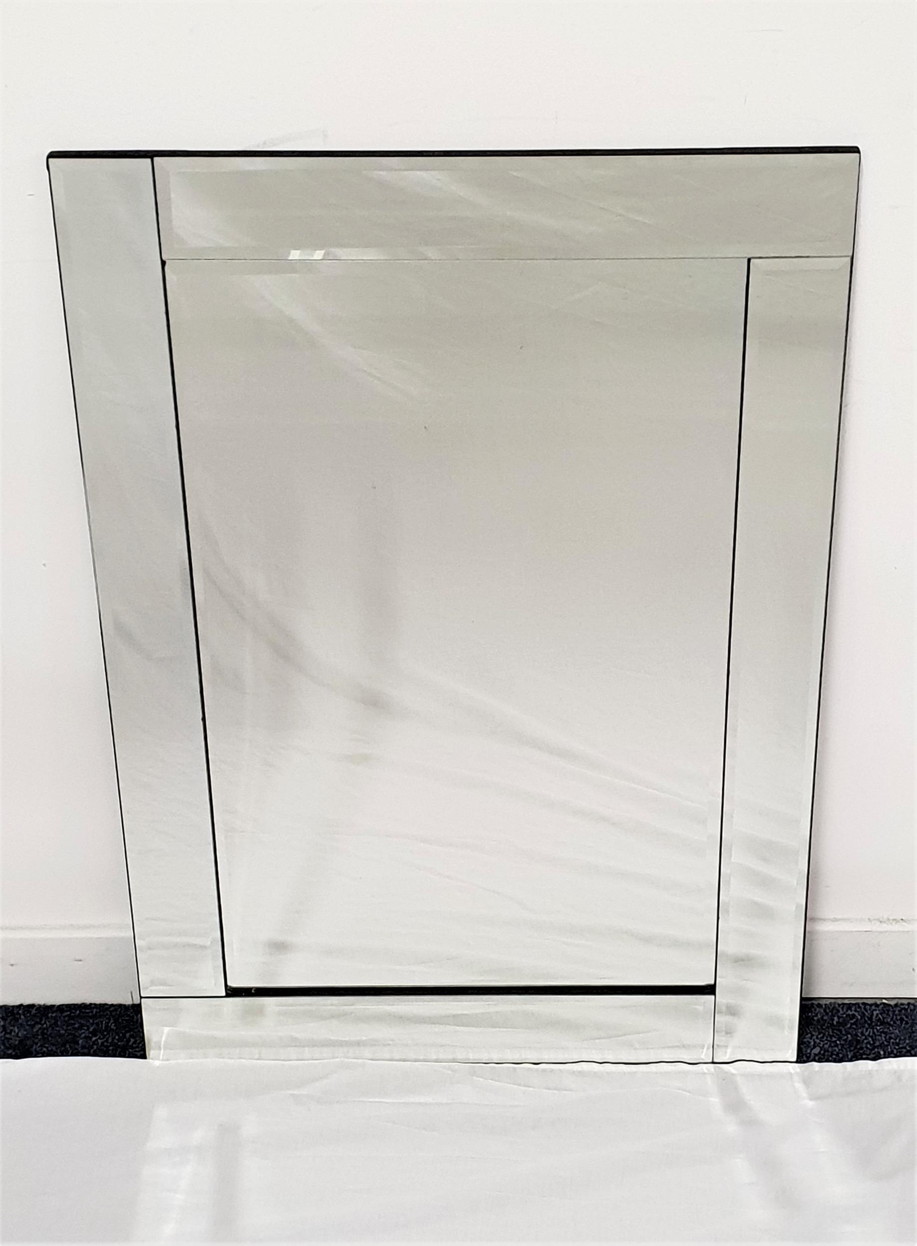 RECTANGULAR WALL MIRROR with a central bevelled plate encased by four narrow bevelled plates, 66.5cm