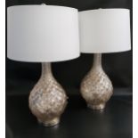 PAIR OF MOTTLED GLASS LAMPS raised on a circular chrome base with a bulbous tapering body and