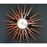 SETH THOMAS SCOTTISH SUN BURST WALL CLOCK with a circular dial with Arabic numerals surrounded by