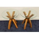 PAIR OF SIDE TABLES each with a circular glass top on oak cross strut supports, 61cm x 50cm (2)