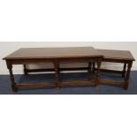 OAK OCCASIONAL TABLE with a rectangular moulded top above a carved frieze, standing on turned
