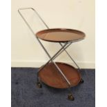 RETRO WEST GERMAN DRINKS TROLLEY with a chrome frame and wood effect laminated plastic removeable