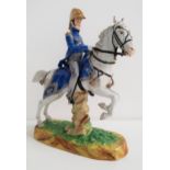 CAPODIMONTE PORCELAIN FIGURINE depicting a French officer on a grey horse, marked to the base '