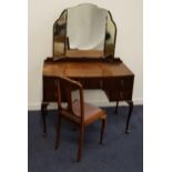 MAHOGANY DRESSING TABLE with a triple mirror back above two long and two short drawers, standing
