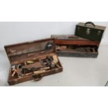 TWO VINTAGE WOODEN TOOL BOXES with a large selection of tools including saws, planes, drills,