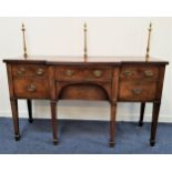 REGENCY MAHOGANY BREAKFRONT SIDEBOARD with a brass galleried back above two central drawers