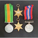 FOUR WWII MEDALS including The Air Crew Europe Star, The 1939-1945 Star, The Defence Medal and the