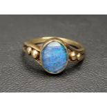 OPAL TRIPLET RING on ten carat gold shank with bead detail to the split shoulders, ring size S