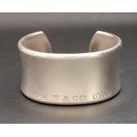 TIFFANY & CO 1837 COLLECTION SILVER CUFF BANGLE stamped with 925, T & CO, 1837 on the exterior