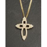 ATTRACTIVE DIAMOND CROSS PENDANT the cross of pierced design with diamonds totalling approximately