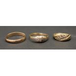 THREE GOLD RINGS comprising a two-tone engraved fourteen carat gold ring, approximately 1.5 grams