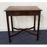 WYLIE & LOCHHEAD MAHOGANY SIDE TABLE with a rectangular moulded top above a carved frieze,
