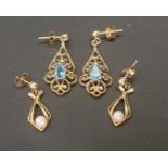 TWO PAIRS OF NINE CARAT GOLD DROP EARRINGS one pair with oval cut blue topaz gemstones within