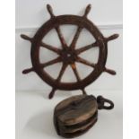 NAUTICAL INTREST a ships eight spoke wheel with iron banding, 93cm diameter, together with a large