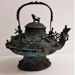 EXTREMELY LARGE ZOOMORPHIC BRONZE CEREMONIAL KETTLE from Brunei or Saranak, cast with a dragon