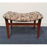 FRANCE & SON DANISH TEAK DRESSING STOOL with a bow shaped seat, standing on tapering supports, 38.