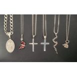 SELECTION OF SILVER PENDANTS ON CHAINS comprising a Virgin Mary pendant, a red butterfly with a