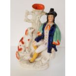 19th CENTURY STAFFORDSHIRE FLATBACK SPILL VASE named Dog Tray, modelled as a seated gentleman with a