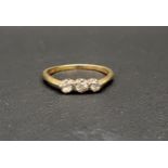 DIAMOND THREE STONE RING the diamonds totalling approximately 0.45cts, in eighteen carat gold and
