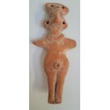 SYRO-HITTITE TERRACOTTA FIGURINE of a goddess, of stylized form with stippled encircling girdle