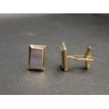 PAIR OF NINE CARAT GOLD CUFFLINKS the rectangular yellow gold cufflinks with a smaller rectangular