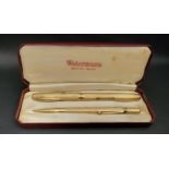 WATERMAN'S NINE CARAT GOLD PEN AND PENCIL SET the side filling fountain pen with fourteen carat gold