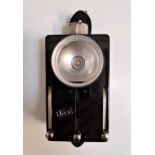 1960s EAST GERMAN MILITARY SIGNAL LAMP with a circular lens and light above three slides for