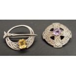 TWO JOHN HART IONA SILVER BROOCHES one a Tara style brooch set with citrine, the other of circular