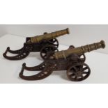 PAIR OF TABLE CANNONS with brass barrels and cast iron carriages, 47cm long (2)