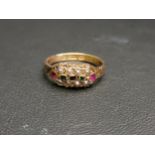 VICTORIAN GEM AND SEED PEARL SET RING with ruby, emerald and garnet, on fifteen carat gold shank