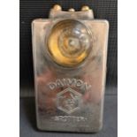 WWII DAIMON TUNIC TORCH in a bright steel case with leather tab to rear, 12cm high